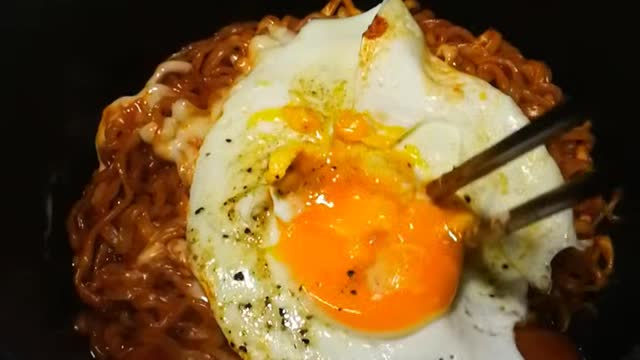 Spicy Ramen dipping egg yolk.