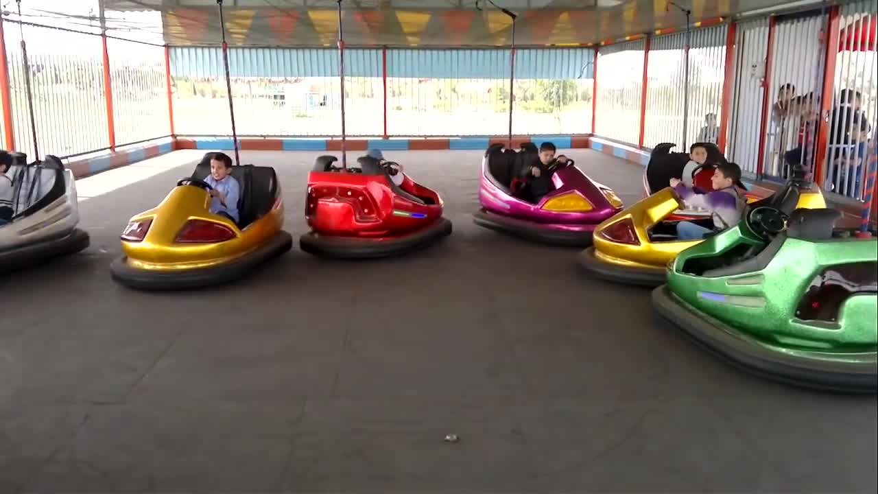 Kids are crazy drivers of small cars in the kids fun land