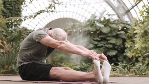 Man Stretching His Body Forward