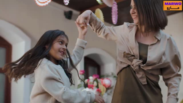 A mother is dancing her daughter the most beautiful dance