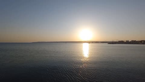 A beautiful landscape of sunset at the sea with calm music