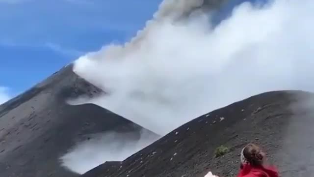 Eating snacks on the edge of an erupting volcano and watching the view?
