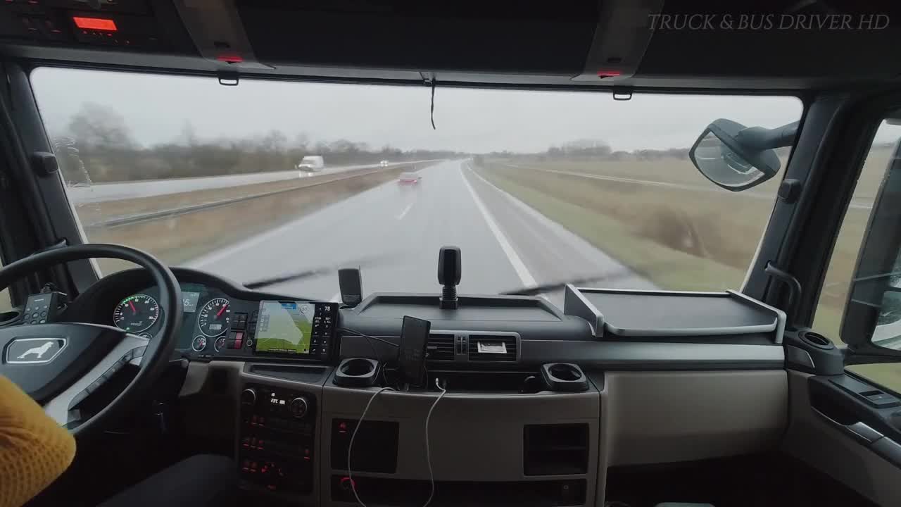 Truck POV | Rainy driving MAN TGX delivery cargo truck Mann forward looking POV