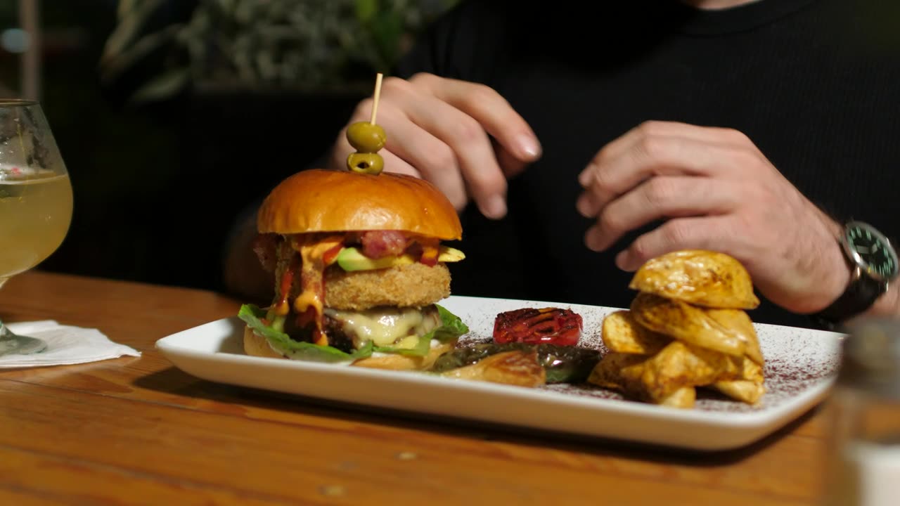 Man eating a hamburger