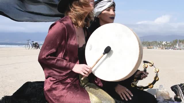 She’s drumming in beach 🏝