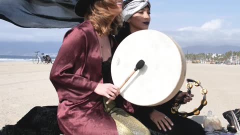 She’s drumming in beach 🏝