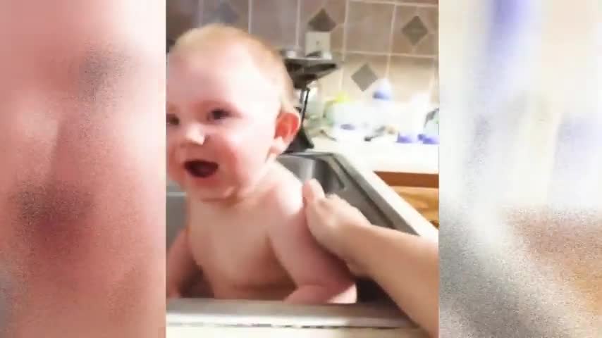 Cute beby playing with water video