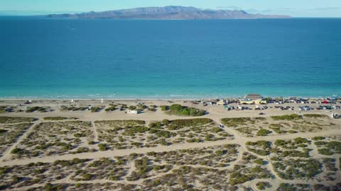 what a coast of a sunny beach from above