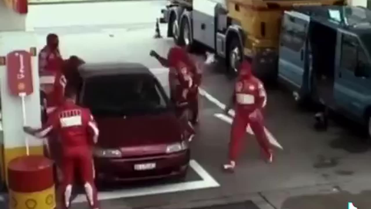 Imagine entering a gas station and being served by Michael Schumacher and the Ferrari team.