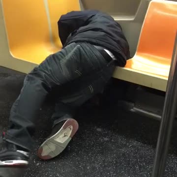 Man asleep on subway falls in crack between seats