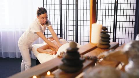 Woman Performing Body Massage