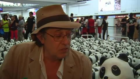 Panda sculptures charm travelers at a Hong Kong airport