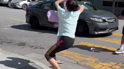 Crazy Asian girl tries to steal dudes car