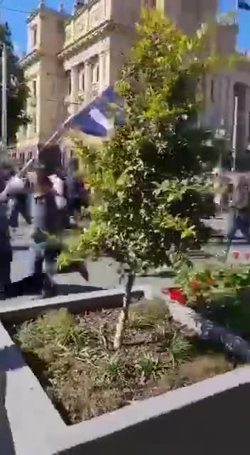 A Ground level view of the moment Melbournians broke police lines. Crazy scenes today.