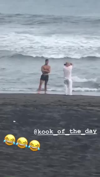 Surfer rides big wave, flies off wave, and crashes into ocean water