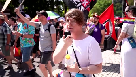 LGBTQ+ supporters march through far-right German town