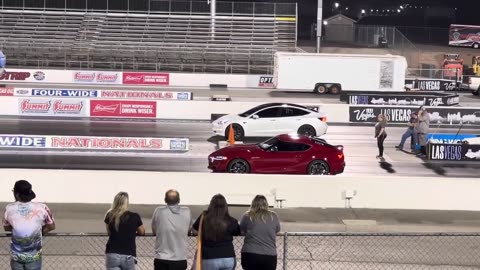 Toyota Supra vs Tesla Model 3 Drag Racing