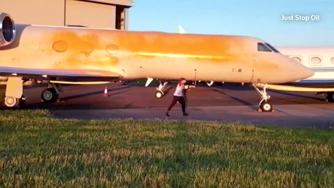 Climate protesters spray private jets at UK airfield