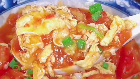 Asian food, scrambled eggs with tomatoes