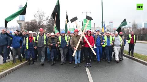 FLARES light up Sarajevo streets at miners' protest