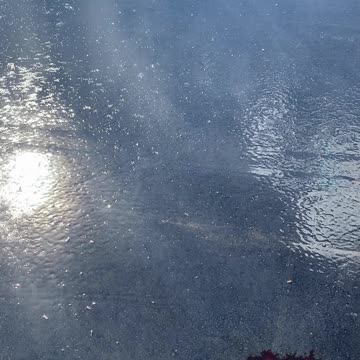 EVAPORATION ON WARM ASPHALT AFTER COOL RAIN!