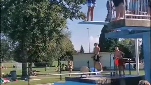 Fat person jumping into swimming pool...