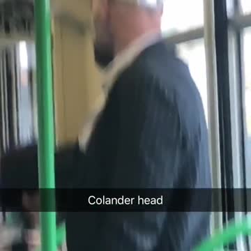 Guy subway silver pot on head colander head