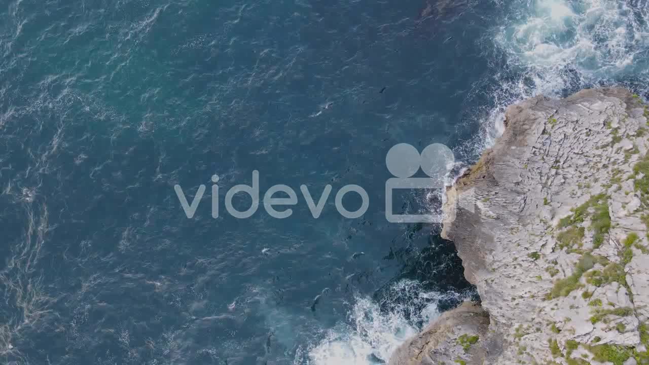 Aerial View Of Sea Waves Breaking On Rocky Coastline 1