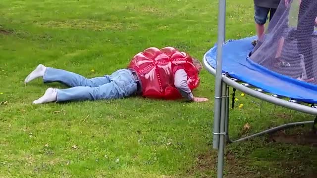 Grandpa Falls Off Trampoline During Sumo Tournament