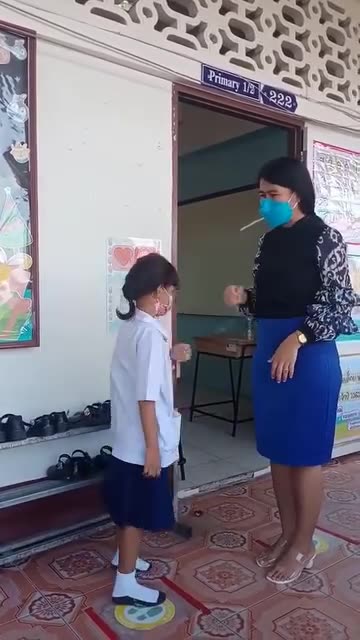 Watch how teacher and a her students greet each other