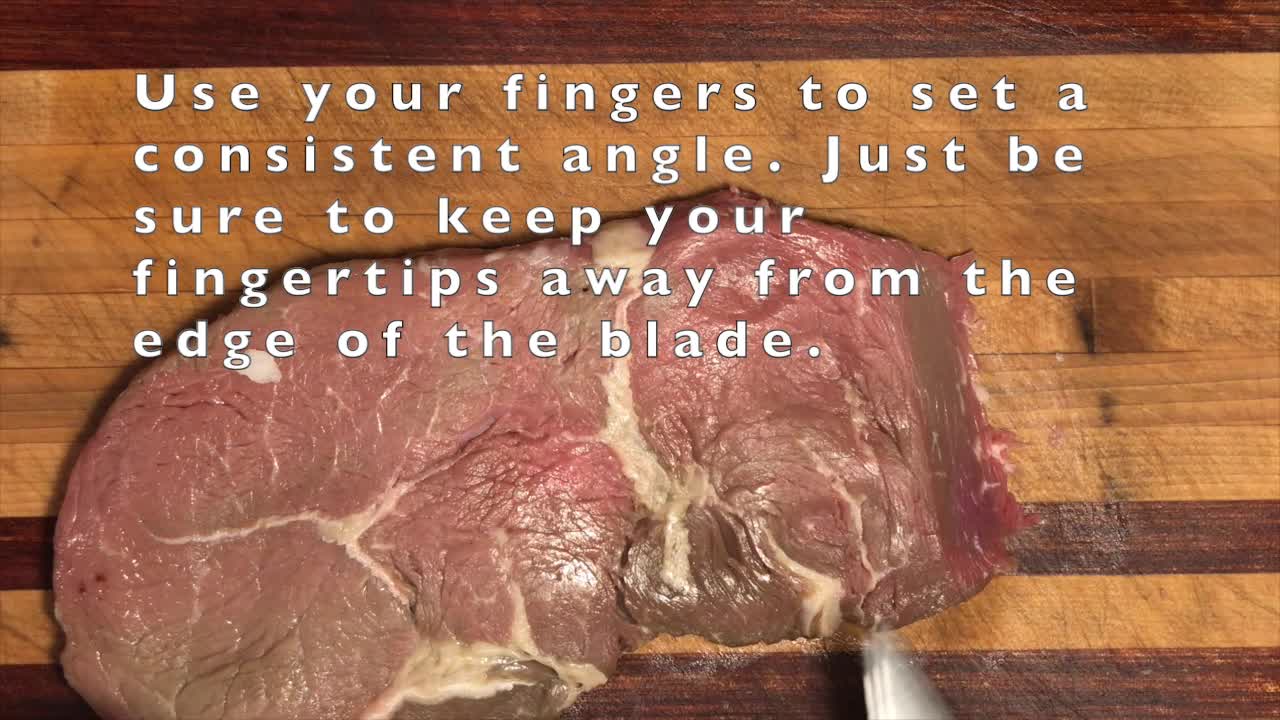 Slant-cutting to make broad slices of meat from a thin steak