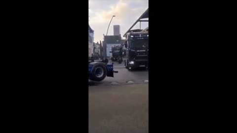 Dutch truckers drive in a convoy through Friesland, Netherlands inspired by events in Canada