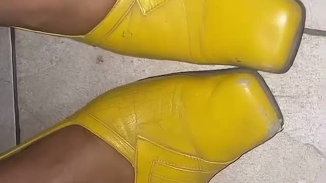 Lady shows her funny shoes collection