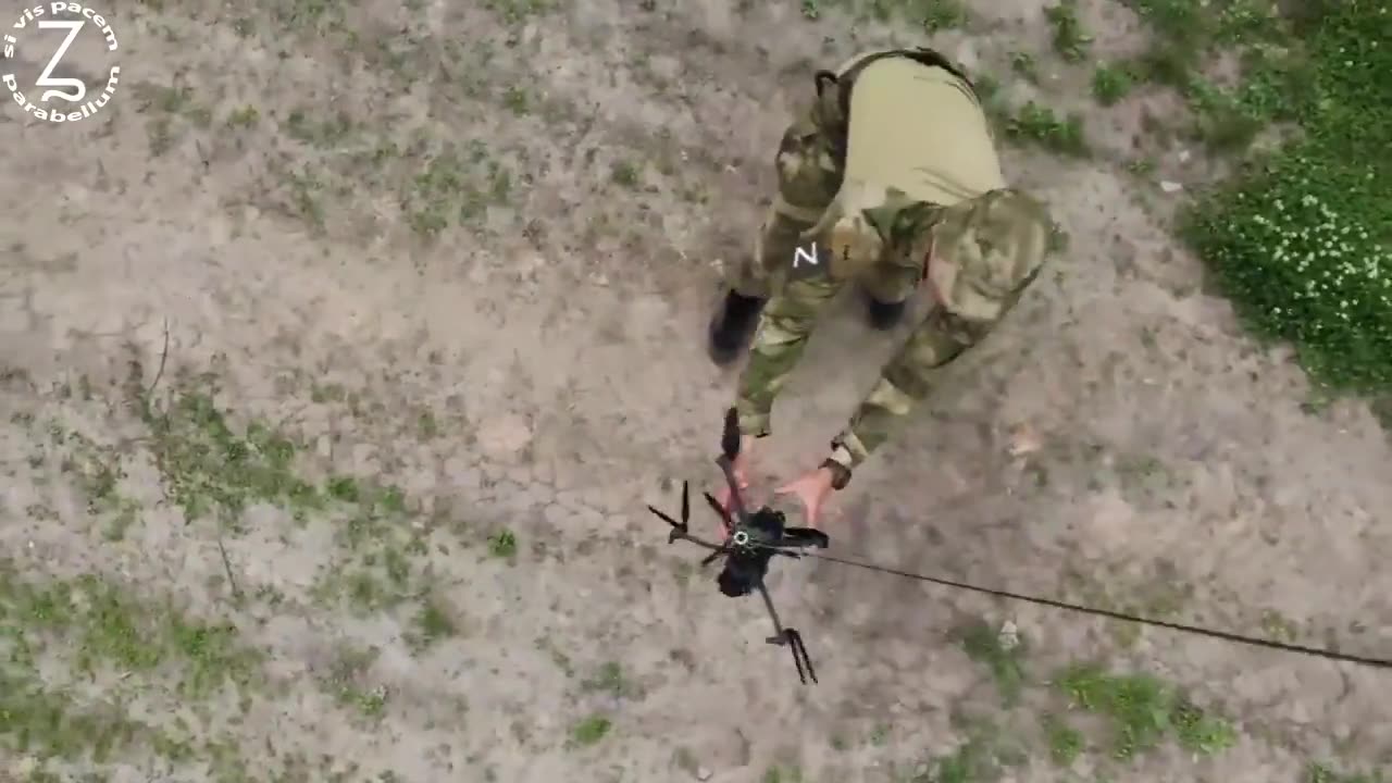 π·πΊπΊπ¦ Evacuation of a Russian fallen drone from the battlefield with the help of another drone.