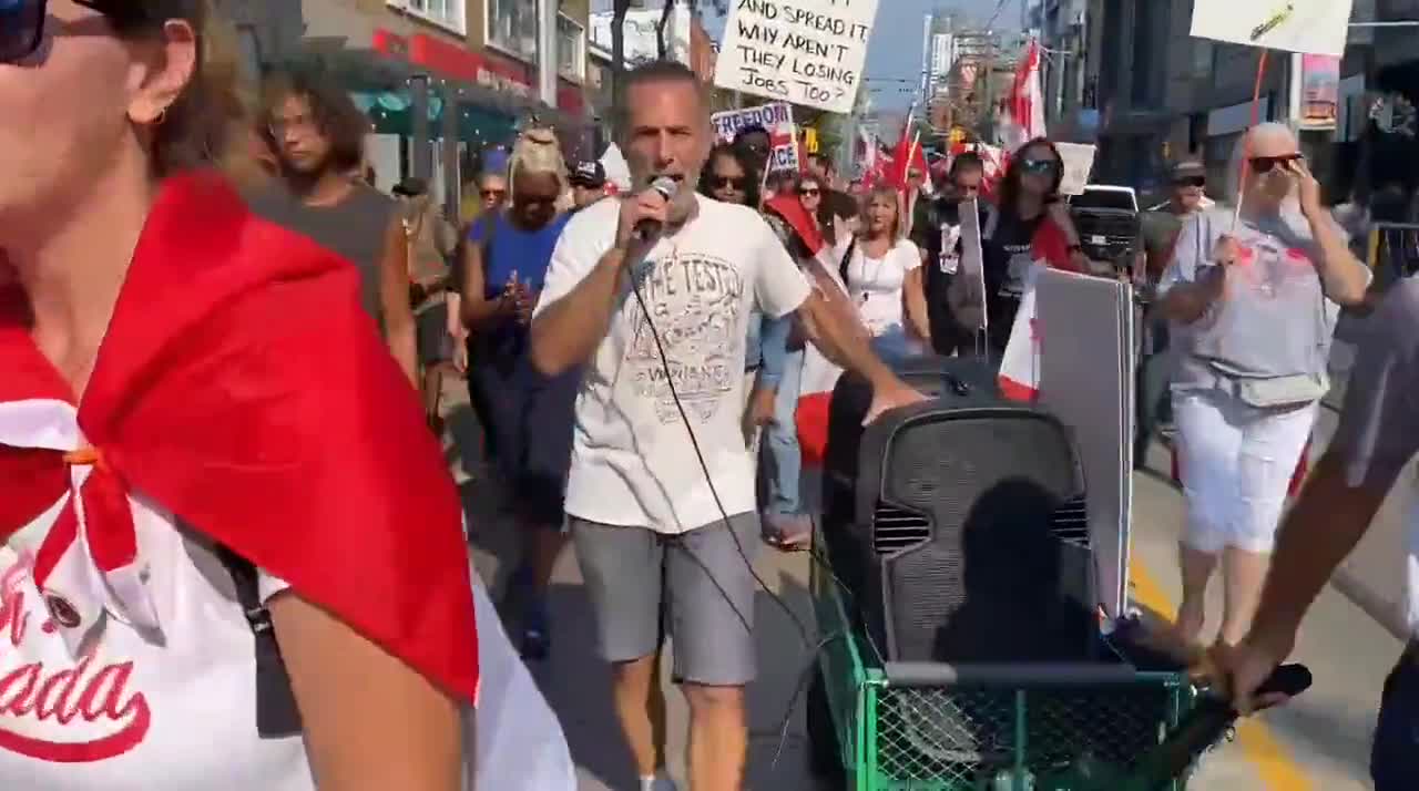 Thousands stormed downtown Toronto to chant: #TrudeauMustGo.