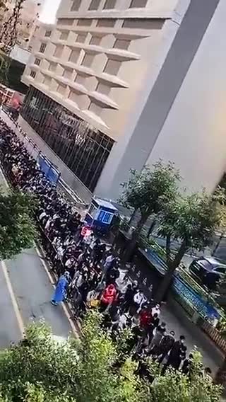 China - Millions of people line up to take a covid test, after 2 people test positive