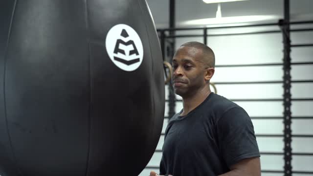 Video Of Man Punching The Sand Bag