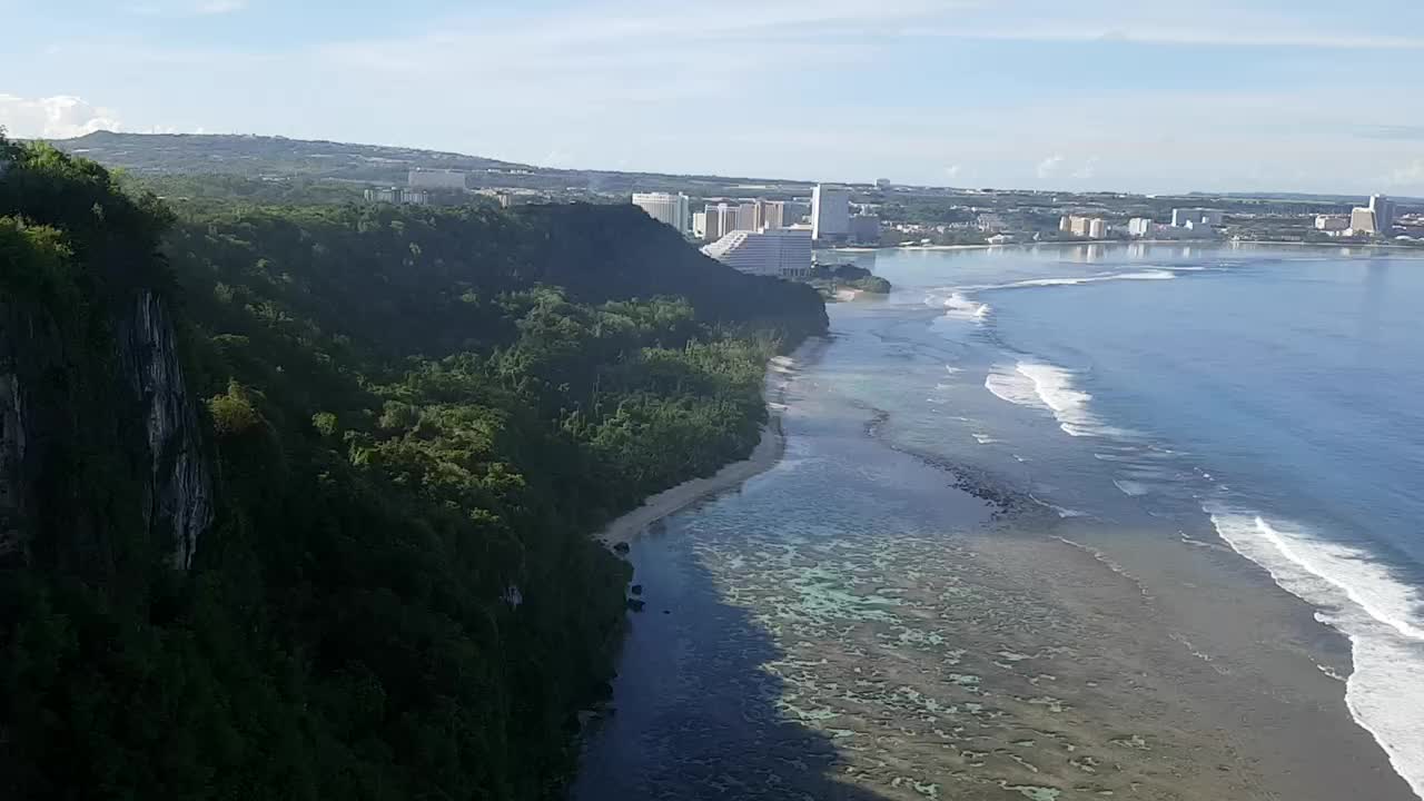 Guam. The view of the sea from the cliff of love. White waves. a calm sea