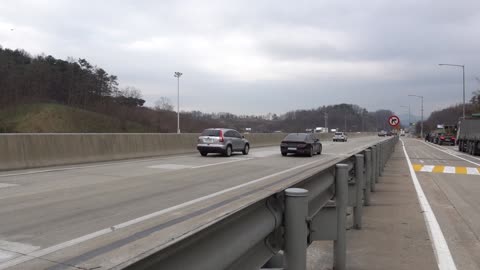 A car on a highway in Korea.2