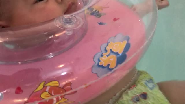 a three month baby swimming