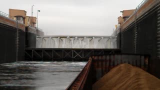 Illinois River Locks lifting a barge & Tug