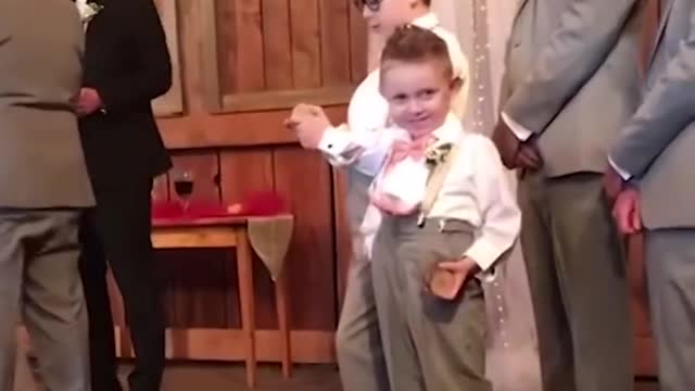 funny kid at wedding