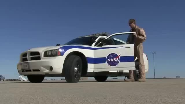 Dodge Charger Safety Chase Car Assisting With ER-2 Landing