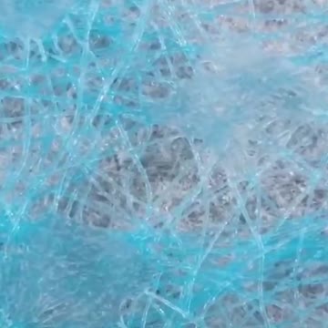 El tamaño del Coronavirus comparado con el tejido de una mascarilla com´n