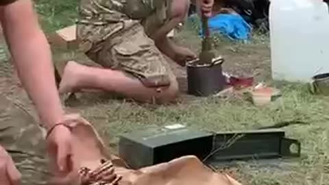 Ukrainian soldiers making mashed potatoes with an RKG-3 AT grenade.