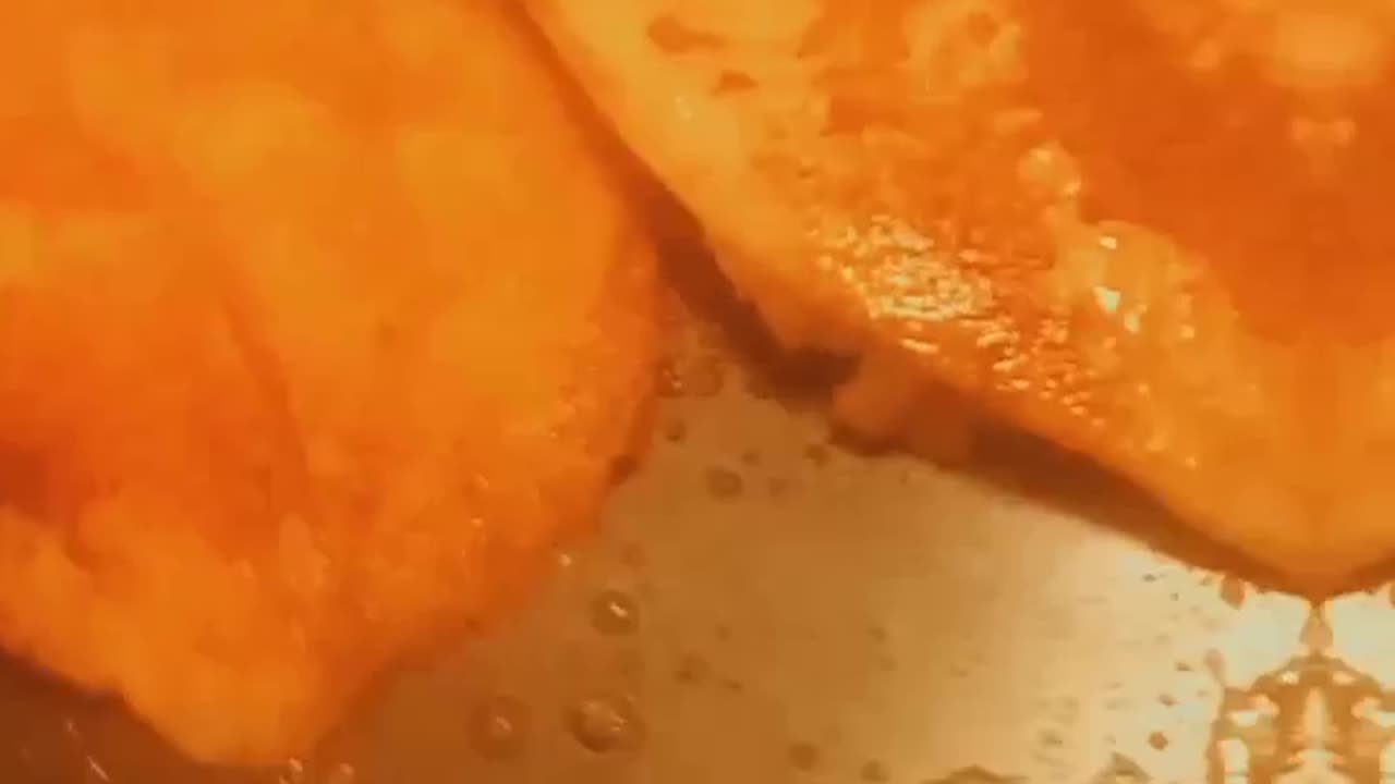 Cajun tilapia with greens and candy yams
