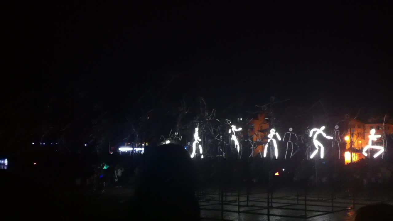 Dancing figures at Lumina Light Festival (Cascais, Portugal)